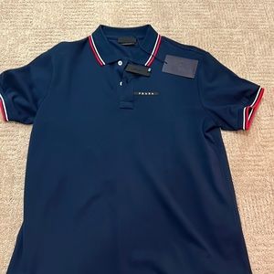 Prada polo . New with tags. Size L . Navy